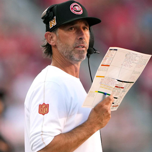 What are the Highlights of Kyle Shanahan's Coaching History