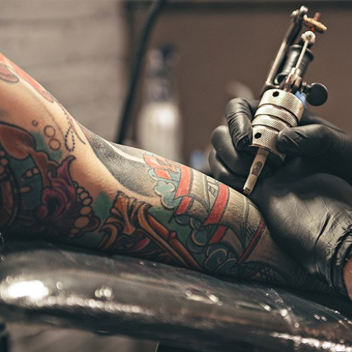 What should you consider before getting a forearm tattoo